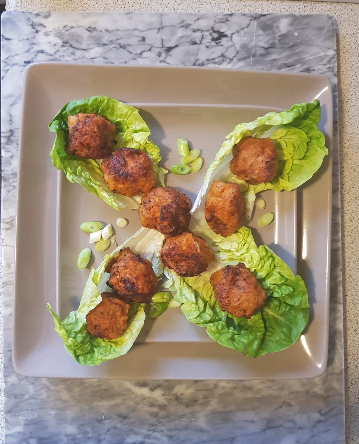 Sweet potato pillows on bed of lettuce